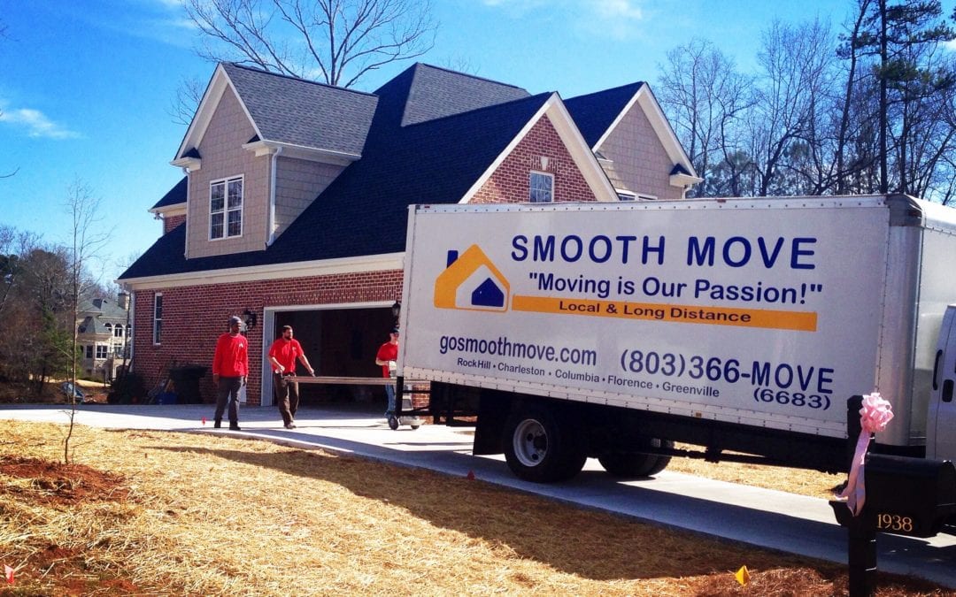 Smooth Move Moving Services in South Carolina | smooth move team moving boxes into house